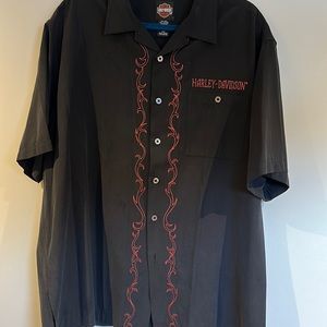 Black short sleeve Harley Davidson button down shirt.